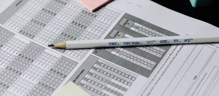 Pencil filling in a multiple-choice answer sheet