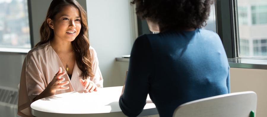 A one-on-one mentoring conversation between two people